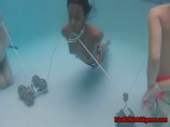 Hardcore punishment with whores getting drowned in the pool
